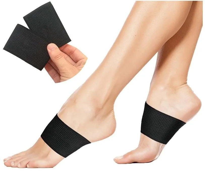 A pair of white elastic foot bandages with a central heart-shaped pad for arch support, on a plain background.