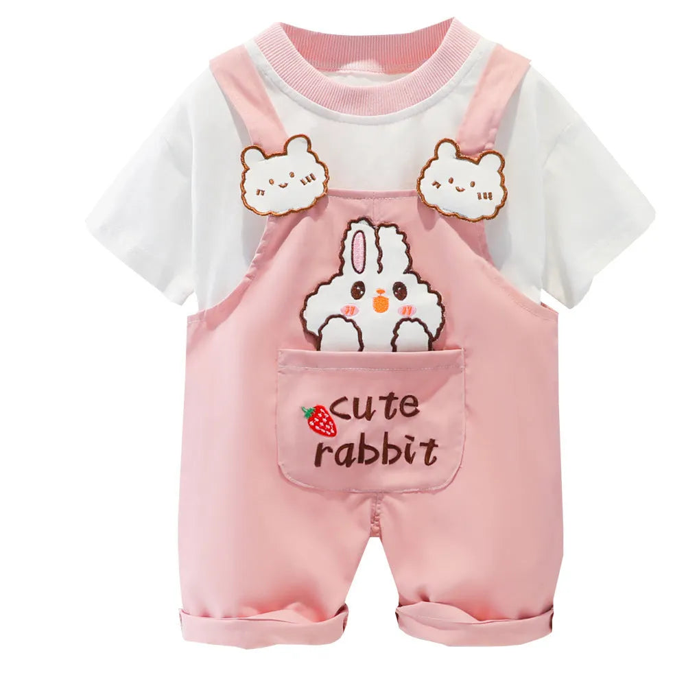 Yellow cotton baby overalls with cartoon print, short sleeves, and adjustable straps on a hanger.