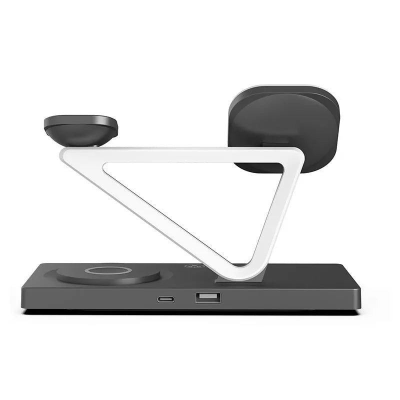 White five-in-one wireless charging station with night lamp, magnetic phone bracket, and watch charging pad on a bedside table.