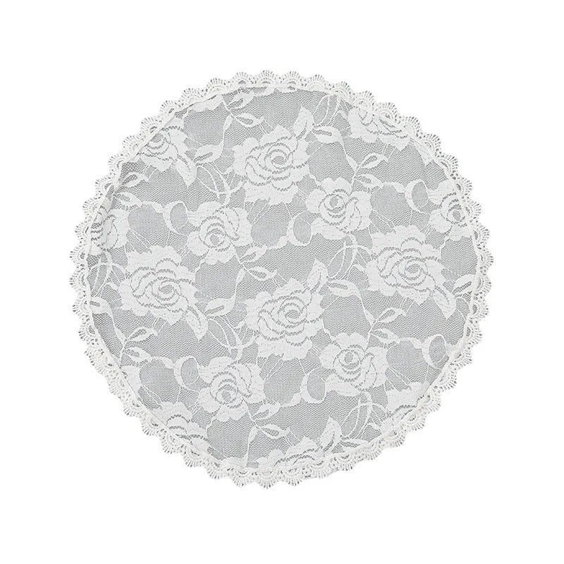 Round white bridal head cover with floral decoration measuring 30cm.