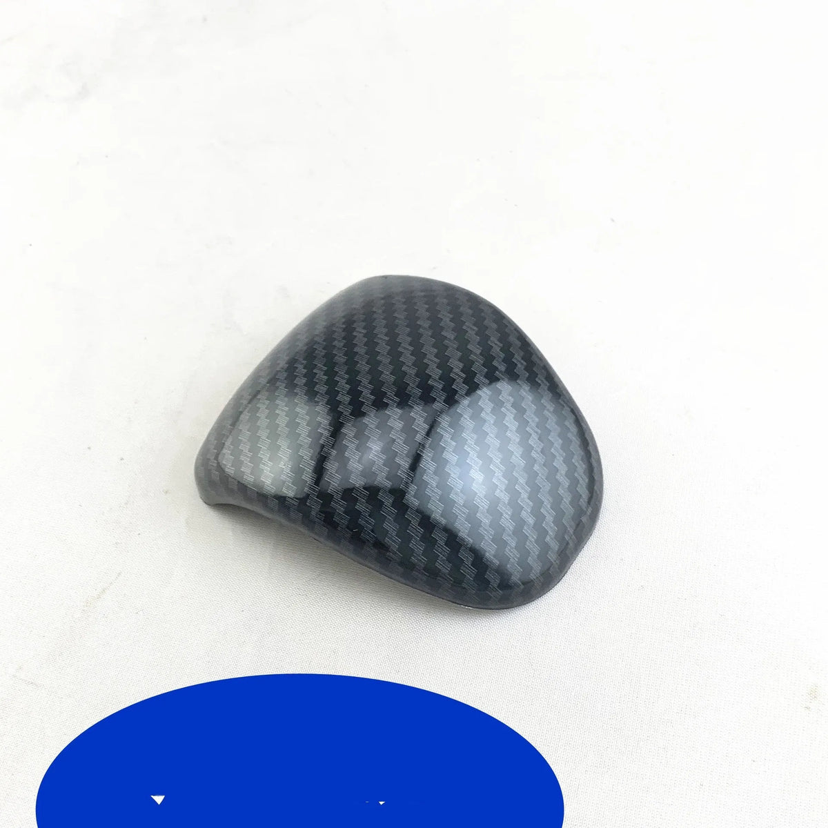 Car gear shift cover with carbon fibre pattern finish