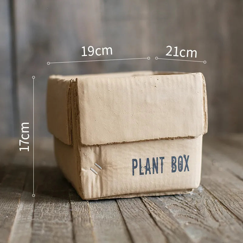 Cement paper box style flowerpot with bottom drainage holes for indoor planting