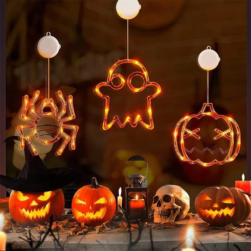 Halloween window hanging LED lights with spider and pumpkin decorations creating horror atmosphere lighting