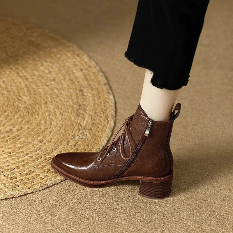 Women's black pointed-toe ankle boots with 5.5cm heel and 13cm shaft on artificial PU upper