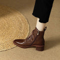 Women's black pointed-toe ankle boots with 5.5cm heel and 13cm shaft on artificial PU upper
