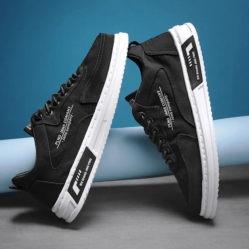 Men's canvas sneakers with letter print, elastic lace-up, breathable mesh lining, platform rubber sole, available in green black grey.