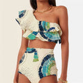 White one-shoulder swimsuit with double-layer lotus leaf skirt and high-leg split design