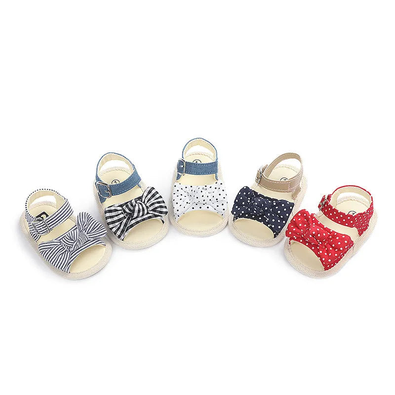 Pair of baby toddler shoes with Velcro fastening, breathable low-top upper, available in white or black, sizes 11cm to 13cm