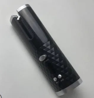 White portable USB charging mini curling iron with gold ceramic barrel and digital temperature display.