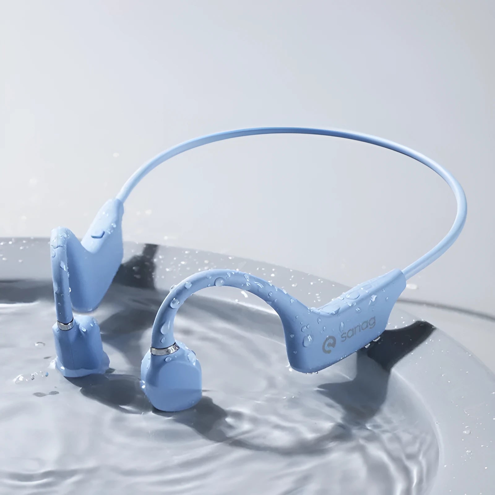 Bone conduction Bluetooth sports headset in hanging neck wireless design on a person running