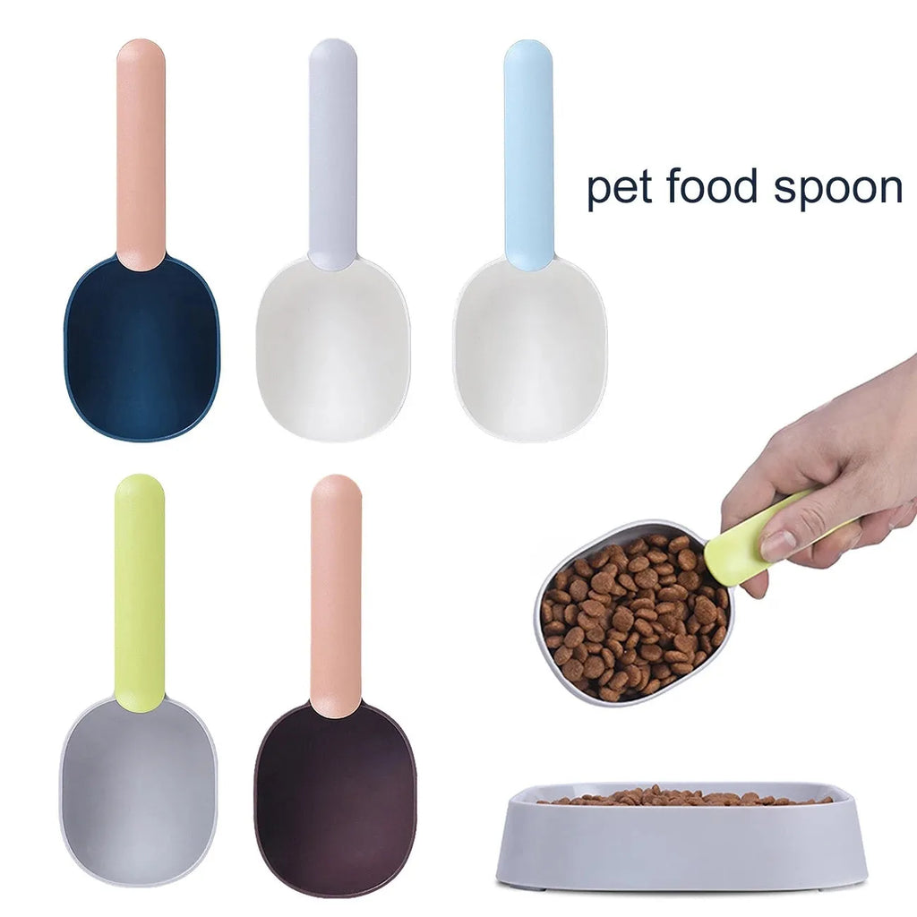 Blue plastic pet food scoop with 1 cup measure and bag clip handle on white background