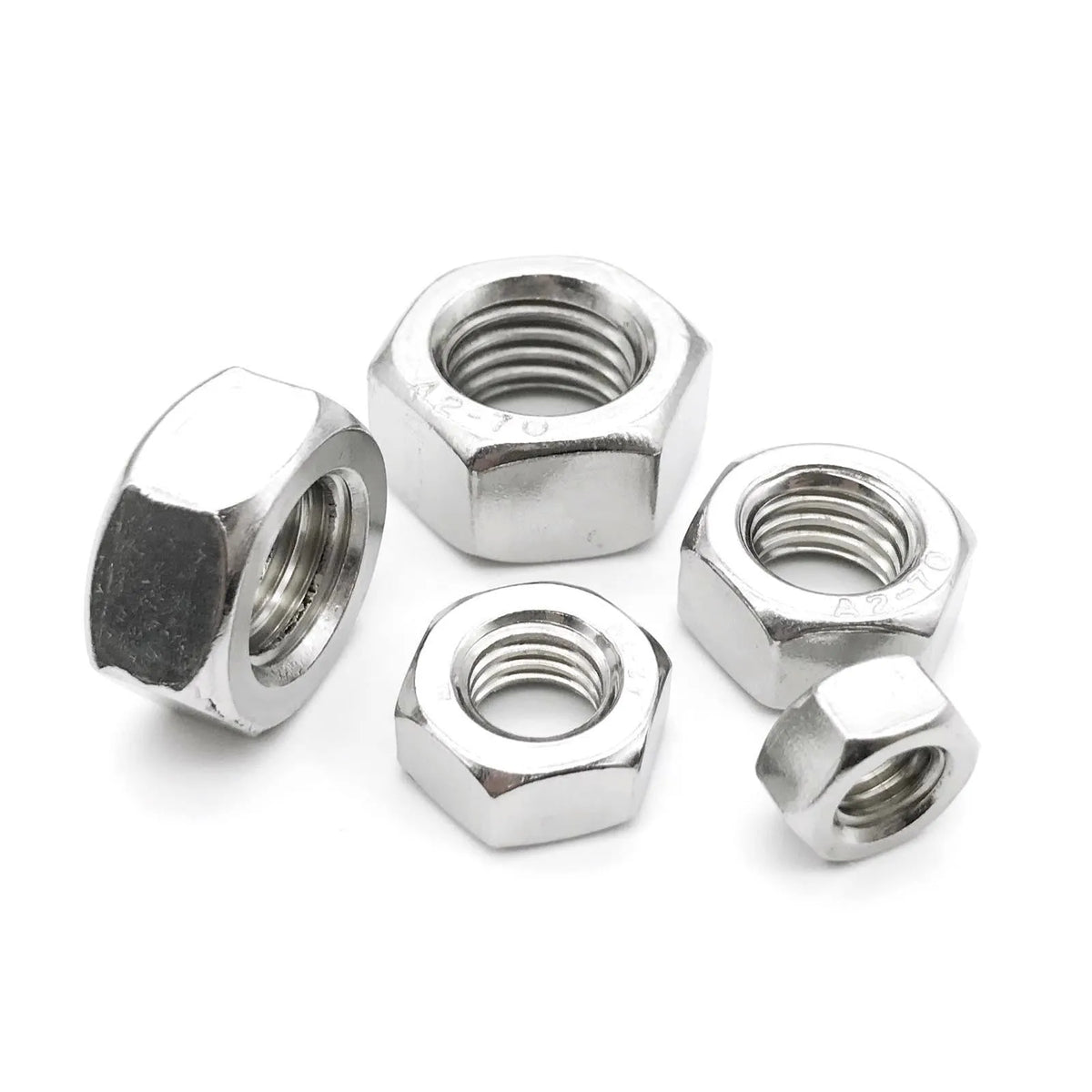 304 stainless steel thickened hexagon nut set with sizes from M5 to M56 on a workbench