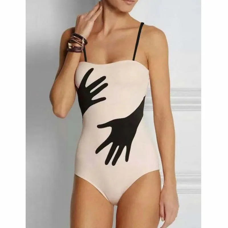 Women's one-piece bikini swimsuit with gauze skirt detail in polyester fabric.