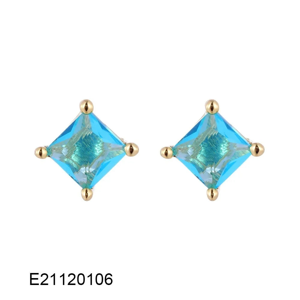 Gold-plated drop earrings with pear-shaped candy-coloured zircon stones on a white background.