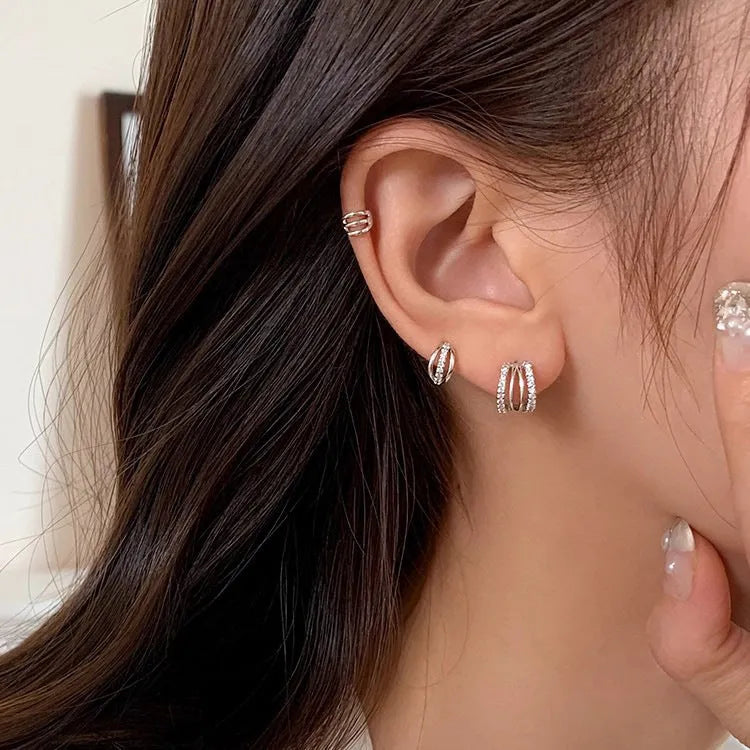 925 silver geometric earrings with silver needle posts in large, medium, and small sizes