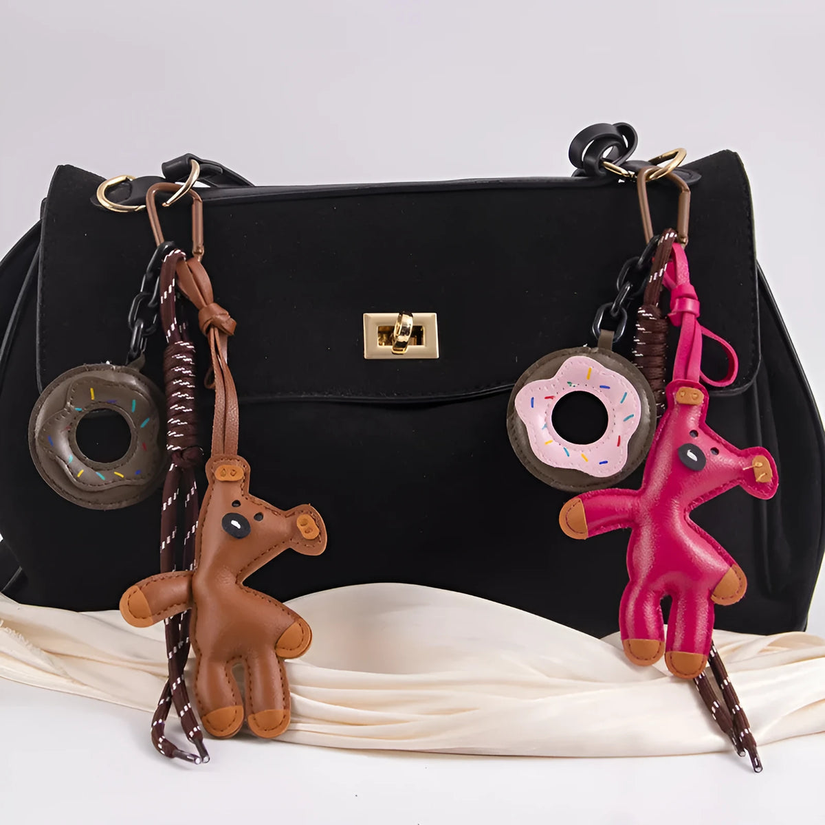 PU leather bear bag charm keychain with donut design in brown, pink, black, white, or rose red.