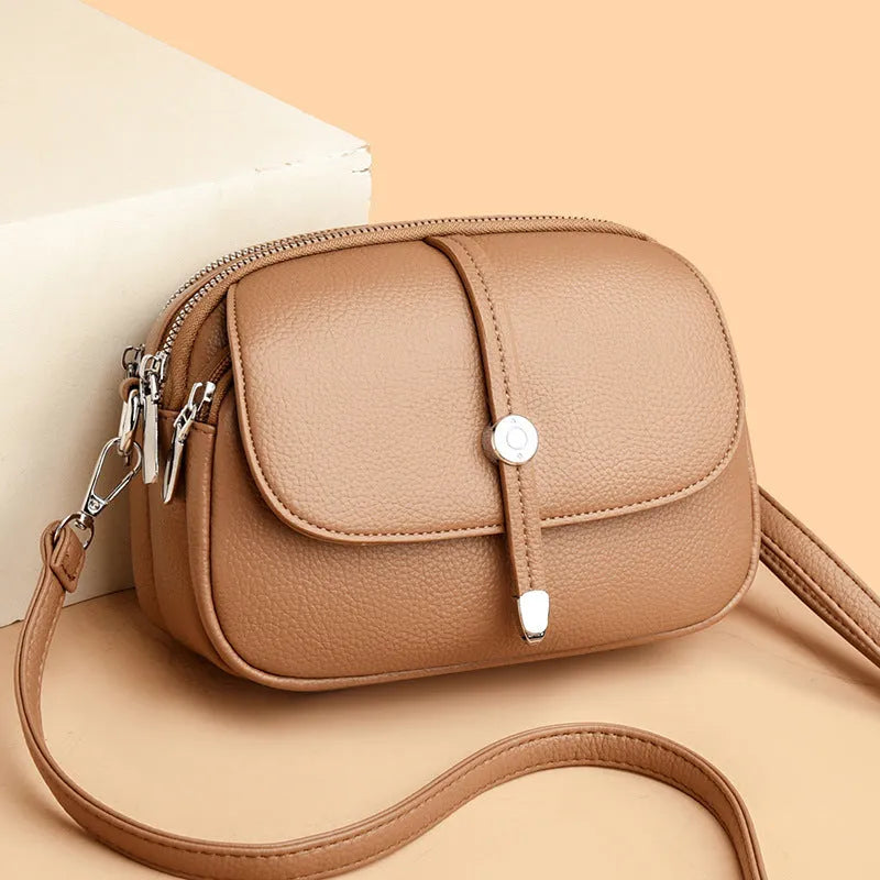 City Simple women's crossbody shoulder bag in soft PU, oval shape, black 2545 colour