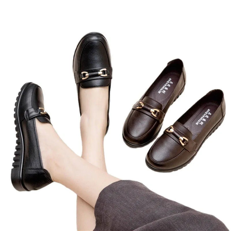 Black women's casual slip-on pumps with round toe, soft sole, and a low flat heel.