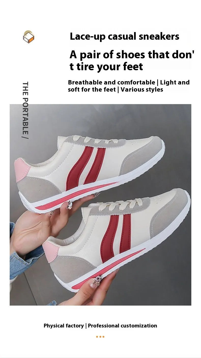 Blue and red lace-up low-top sneakers with a round toe and soft rubber sole.
