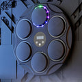 Black smart Bluetooth boxing target with colour-changing LED lights on wall