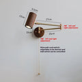 Retro-style rotating wall lamp with adjustable arm and integrated cord switch in walnut or wood finish