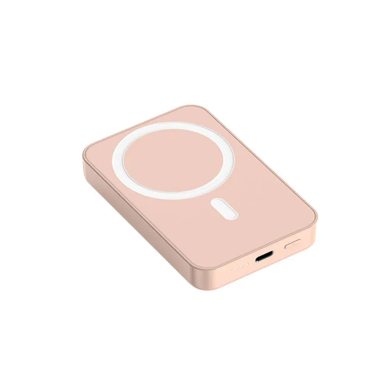 Mobile wireless magnetic plastic power bank in pink purple white colours showing 20000mAh capacity