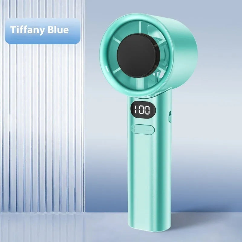 A handheld portable fan in khaki colour, showing six plastic blades and a variable speed control dial.