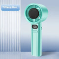 A handheld portable fan in khaki colour, showing six plastic blades and a variable speed control dial.