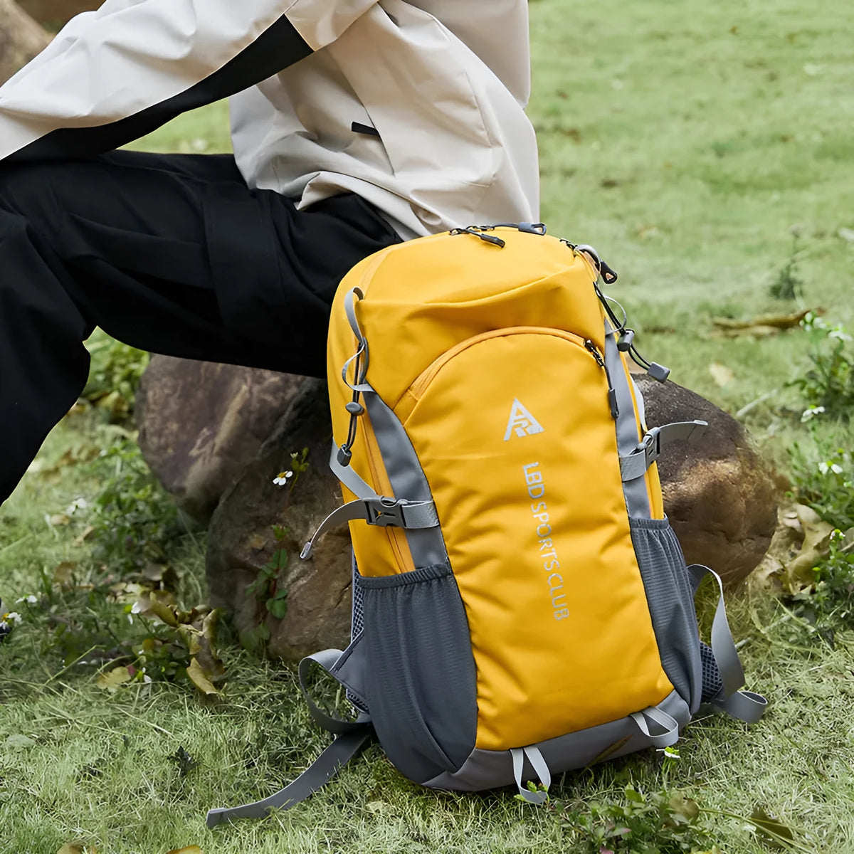 Waterproof Oxford cloth hiking backpack with air pillow belt, letter pattern and unisex design for outdoor sports