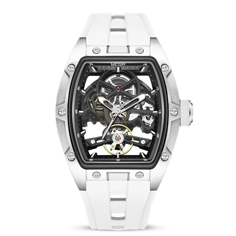 Men's mechanical skeleton watch with hollow dial, steel case, and black silicone band on wrist