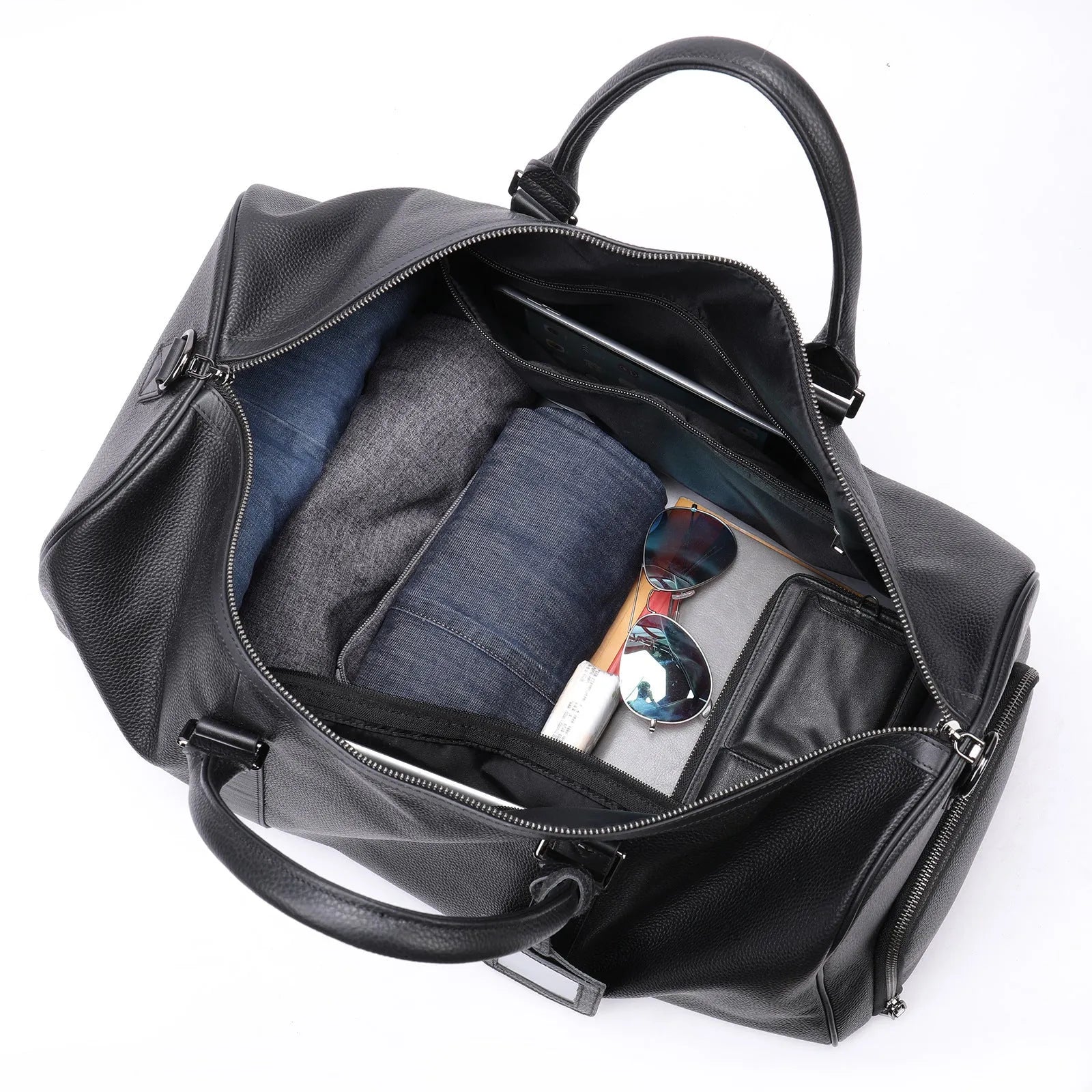 Men's leather excursion bag in black and coffee colours with large capacity below 20 litres