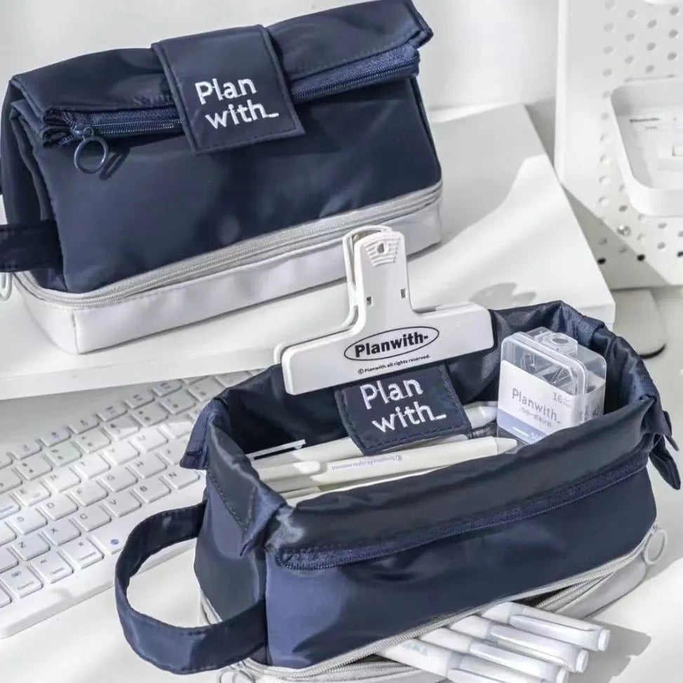 Polyester folding double-layer student pencil case in dark blue, blue, and cream white colour options.