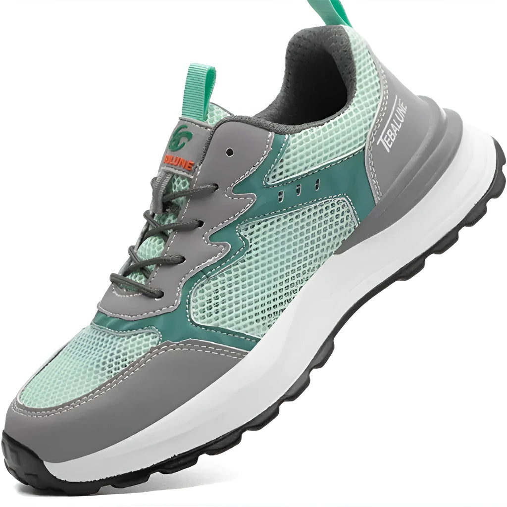 Green low-top safety work shoes with mesh upper panels and a plastic steel toe cap.