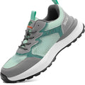 Green low-top safety work shoes with mesh upper panels and a plastic steel toe cap.
