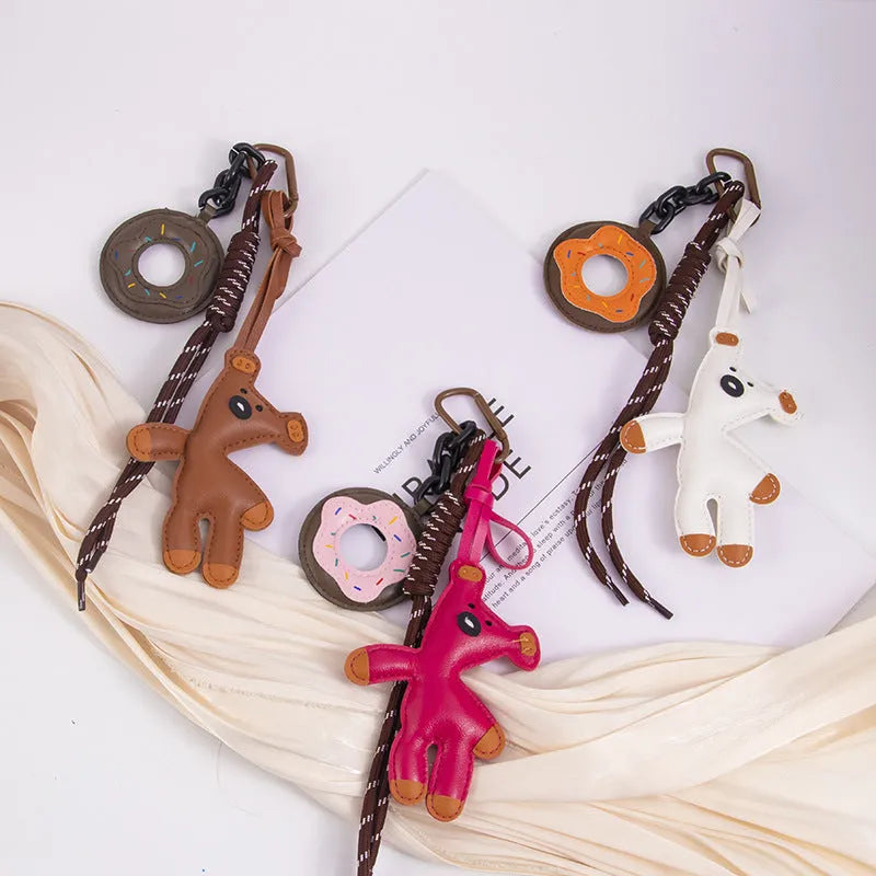 PU leather bear bag charm keychain with donut design in brown, pink, black, white, or rose red.