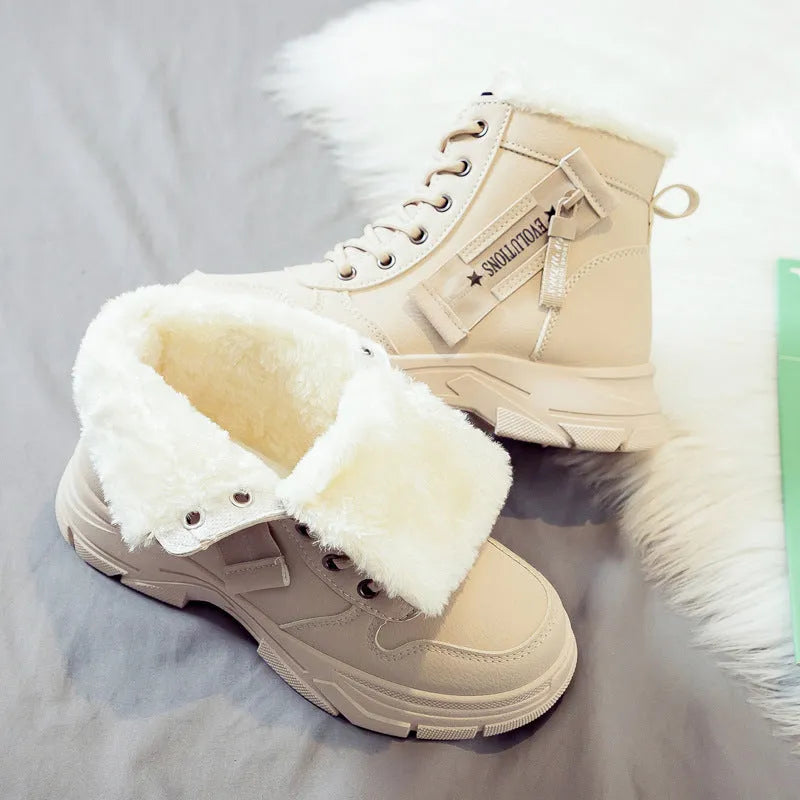 Plus size women's snow boot in black with velvet lining, showing mid-calf height and front lace-up.