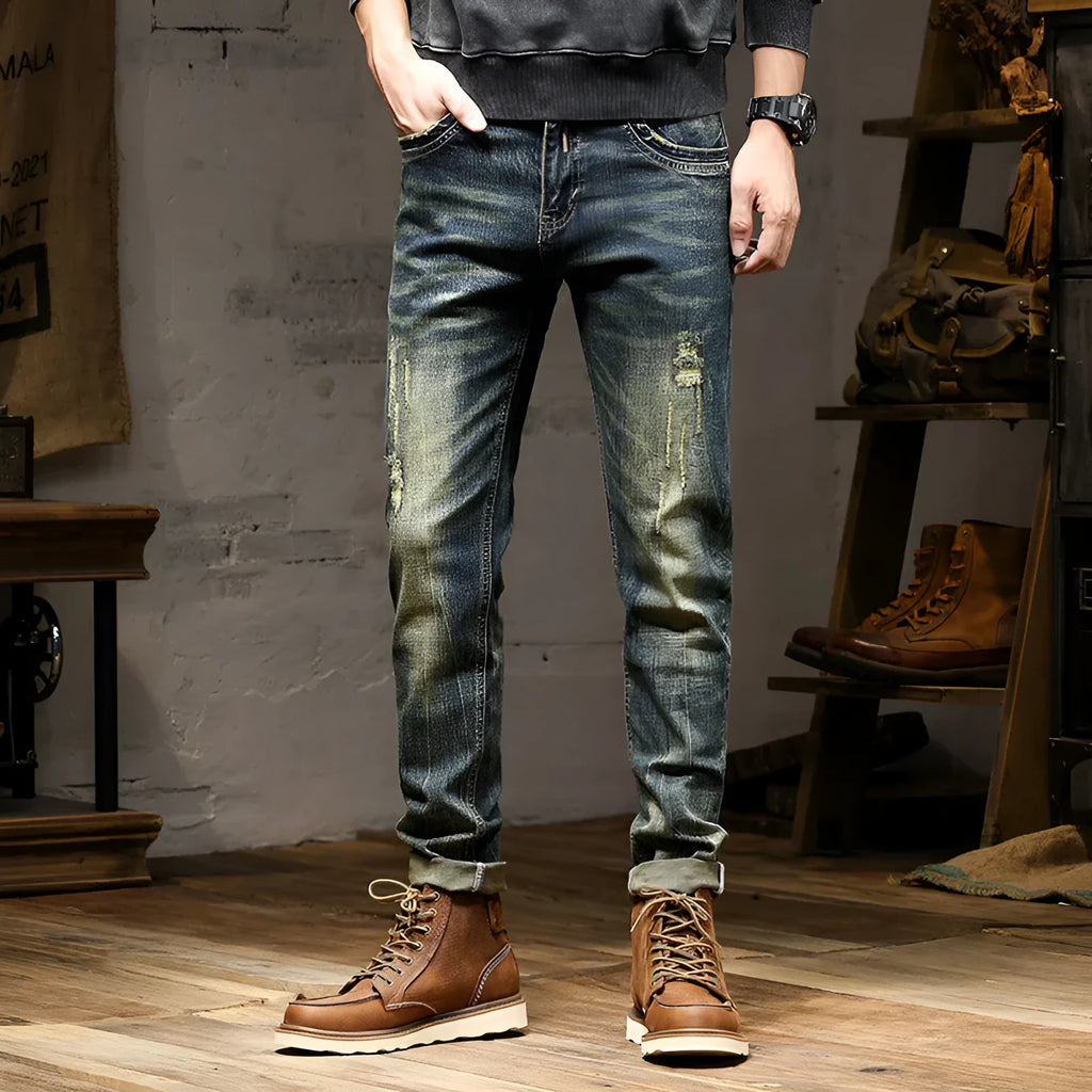 Man wearing retro coloured stretch cotton denim skinny fit jeans with a zip fly.