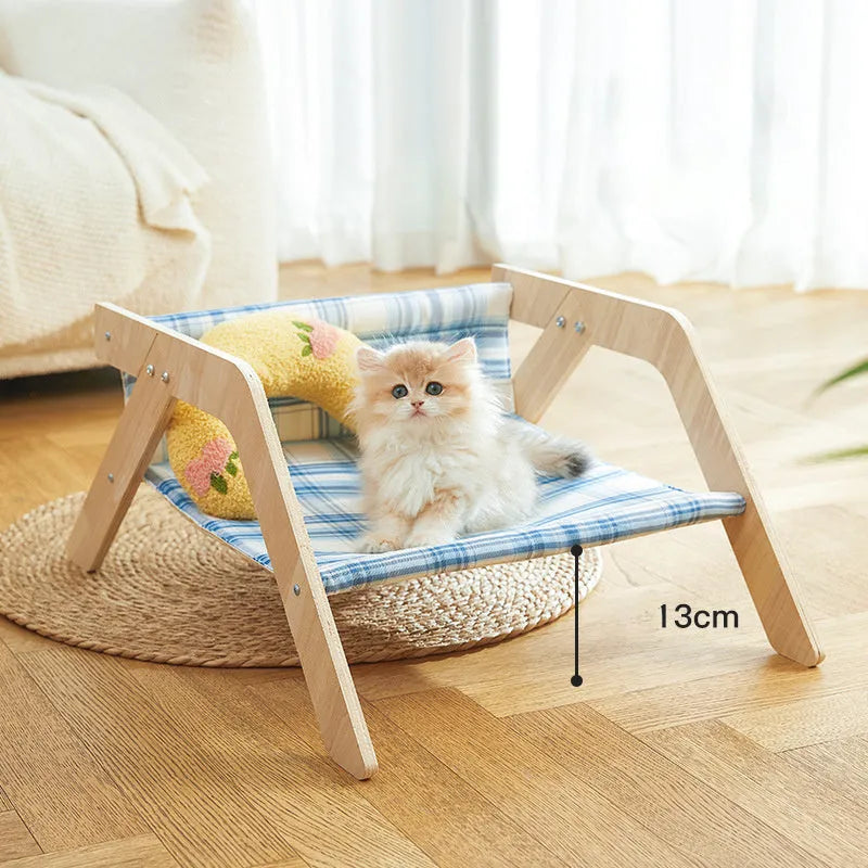 Wooden frame cat hammock bed with blue cloth in beach chair design for indoor cats.