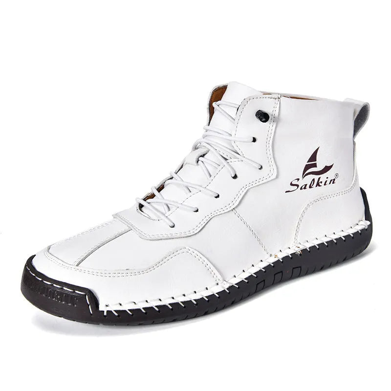 Men's beige retro-style mid-calf boots with an elastic band and flat rubber sole on a white background.
