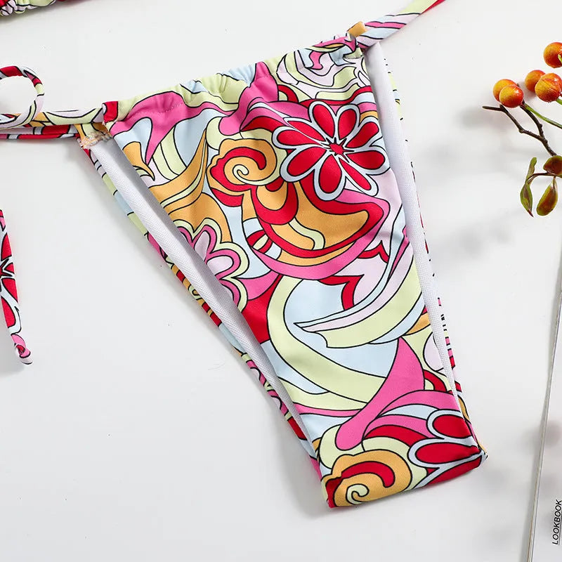 Women's triangle printed bikini with separate top and bottom system featuring hanging neck design