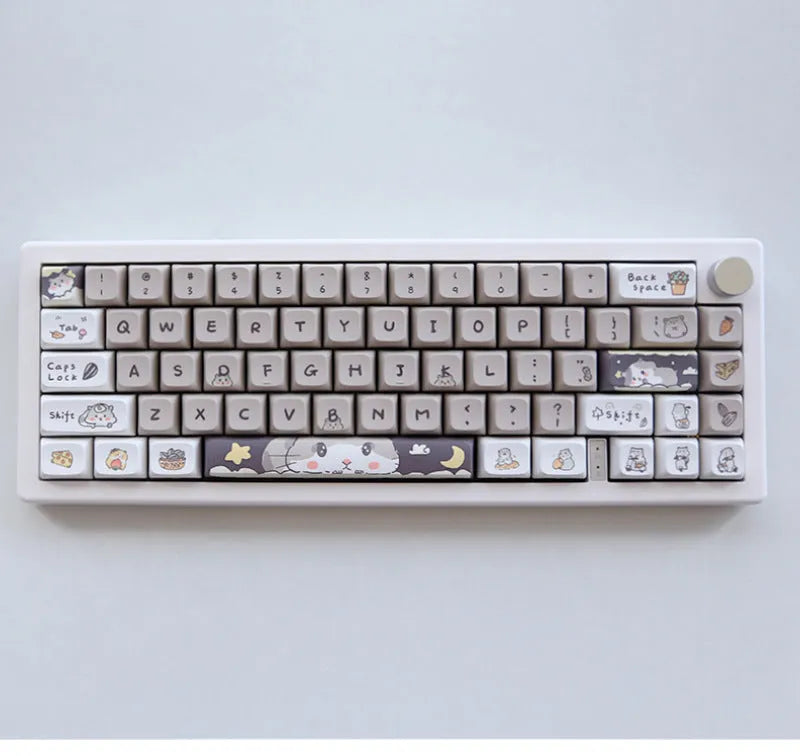 XDA profile mechanical keyboard keycaps in custard colour palette with grey and yellow accents