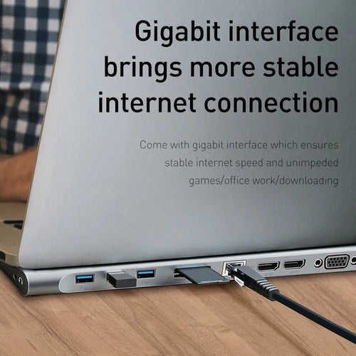 Grey aluminium 10-port docking station with cooling bracket showing HDMI, VGA, USB and Ethernet ports