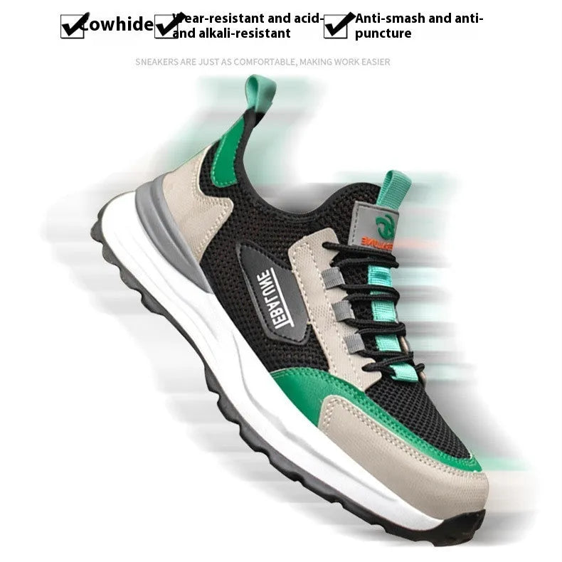 Black and green low-top safety shoes with a mesh upper and plastic steel toe cap on a white background.