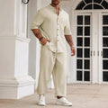 Men's apricot coloured cotton linen casual short-sleeve shirt and long trousers set laid flat
