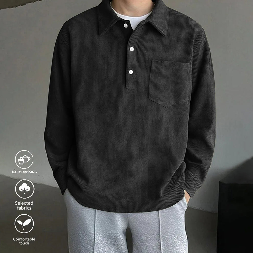 American retro casual bottoming shirt pullover in black, loose fit polyester fibre top on plain background.