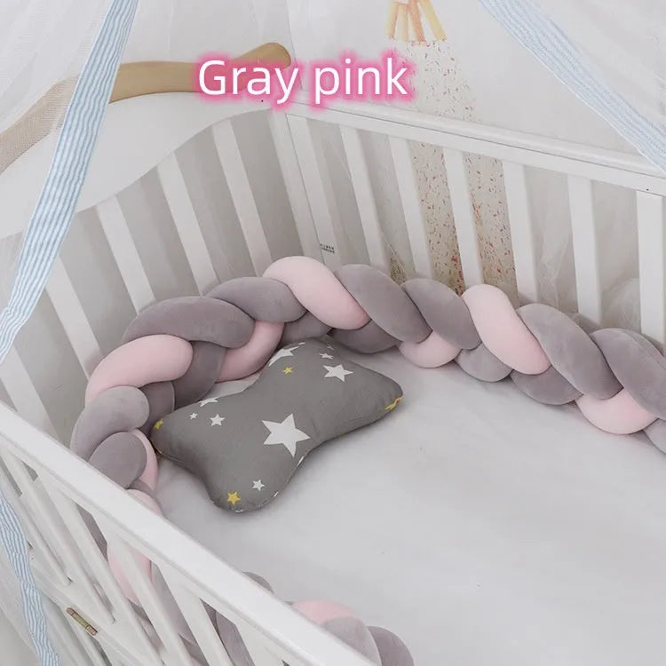 Baby crib bumper braid knot pillow cushion in spandex velvet fabric, shown in a multi-colour option.