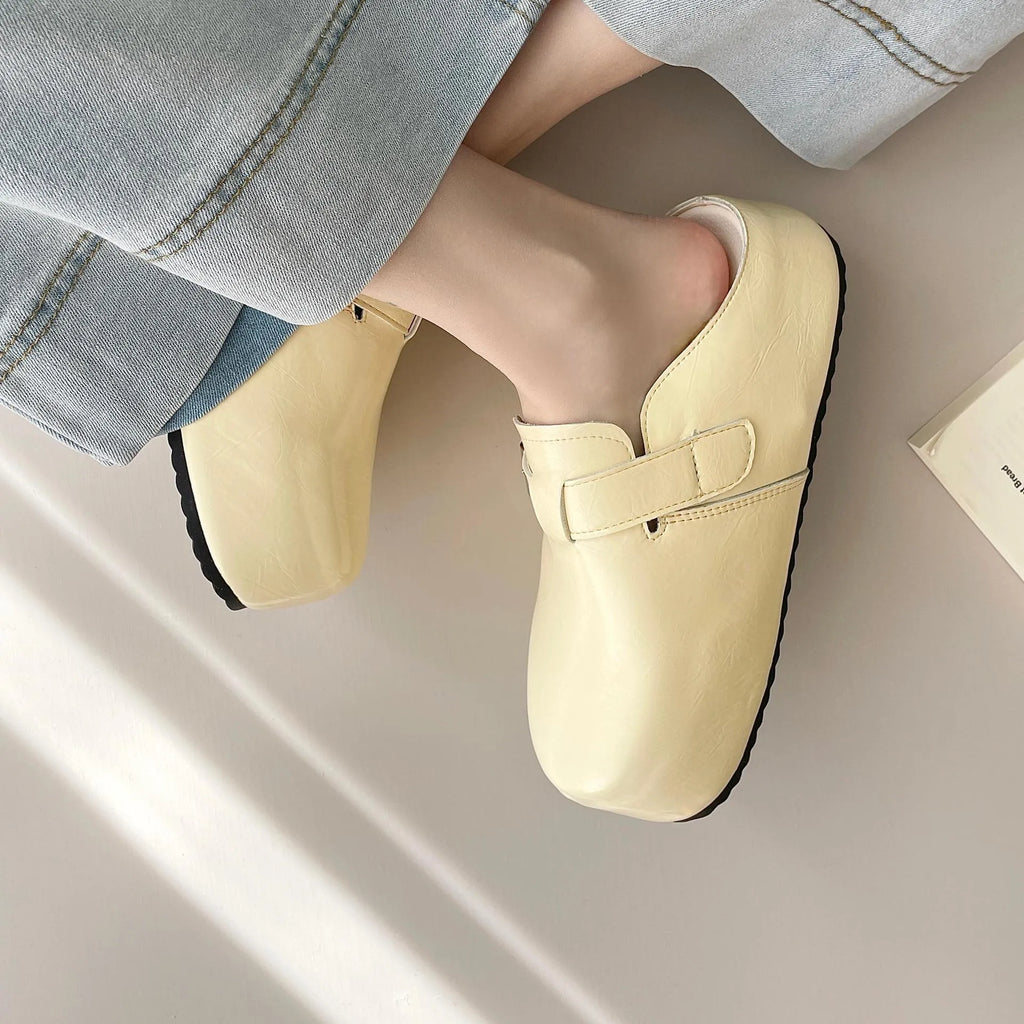 Flat buckle casual sneakers in yellow with a round toe and PU upper.