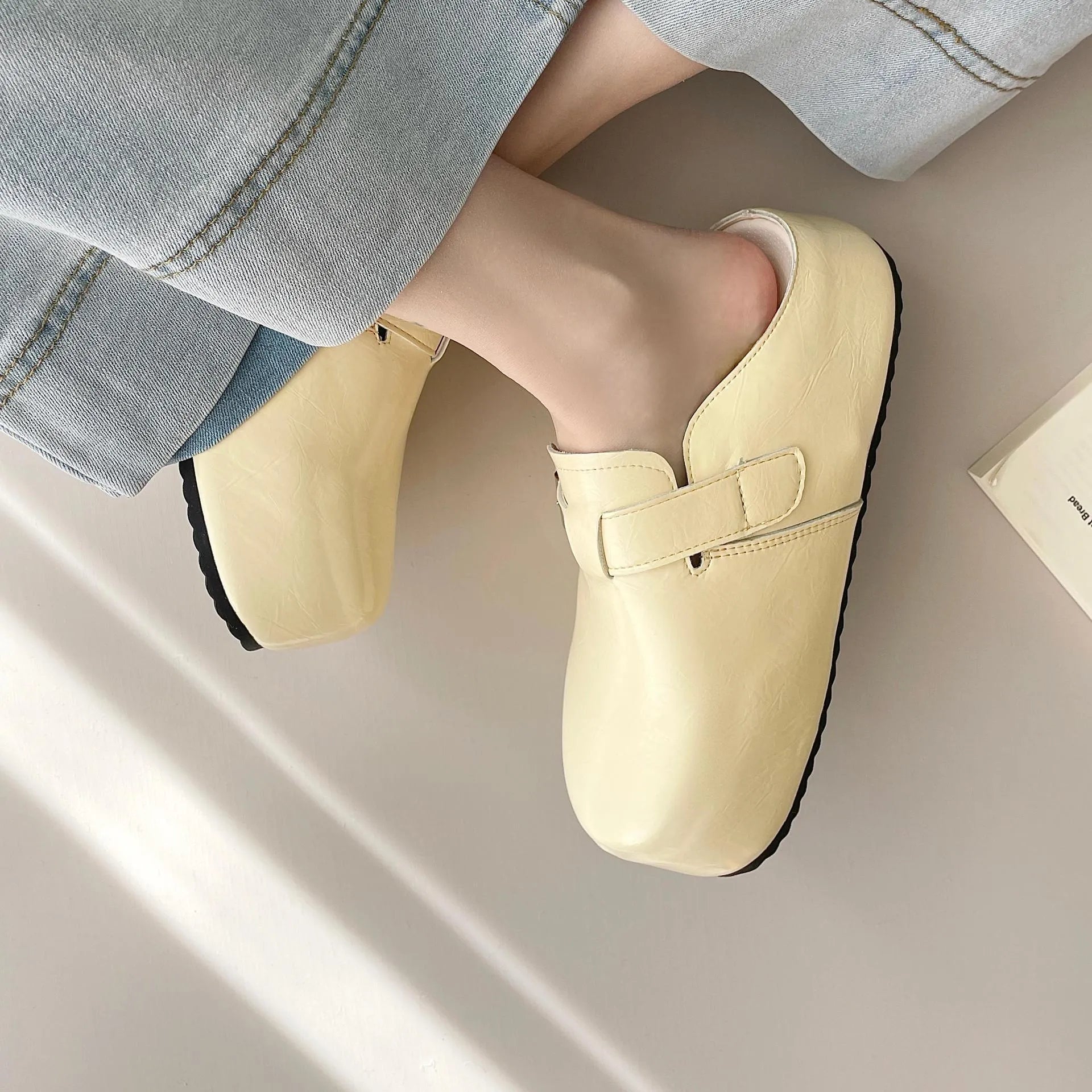 Flat buckle casual sneakers in yellow with a round toe and PU upper.