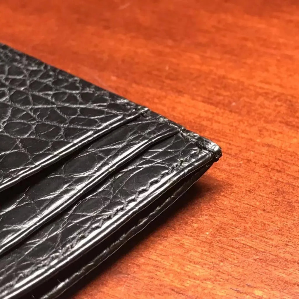 Genuine leather card wallet with crocodile pattern and checker design, shown in black and coffee colours