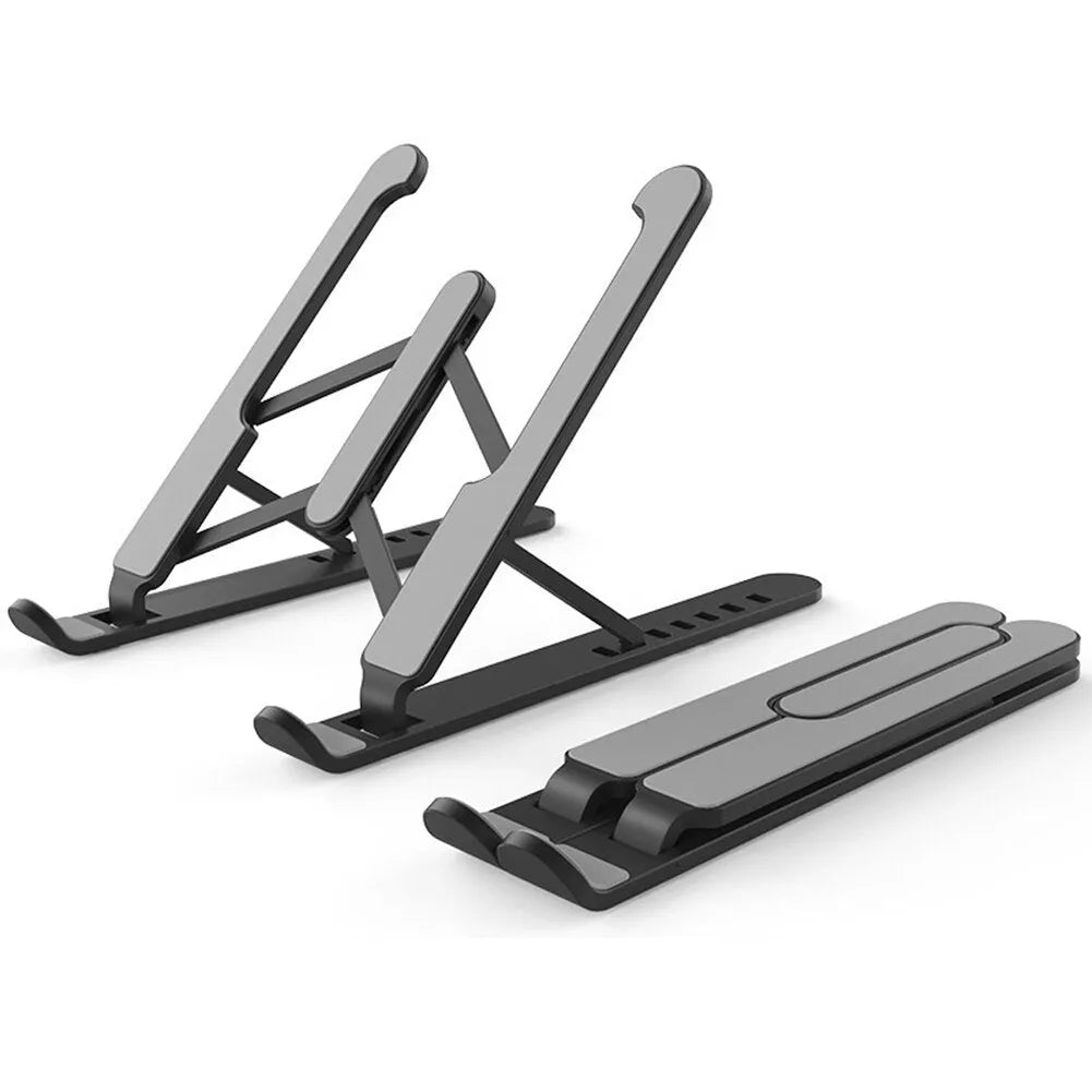 Black adjustable laptop stand with six gear settings, folded for portability, on a desk